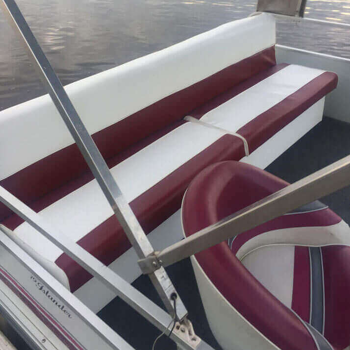Pontoon bench with maroon and white stripes